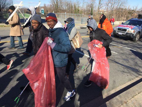 Barry Vettis is picking up trash during the MLK Peace Walk "to help D.C. look beautiful." (WTOP/Kristi King)