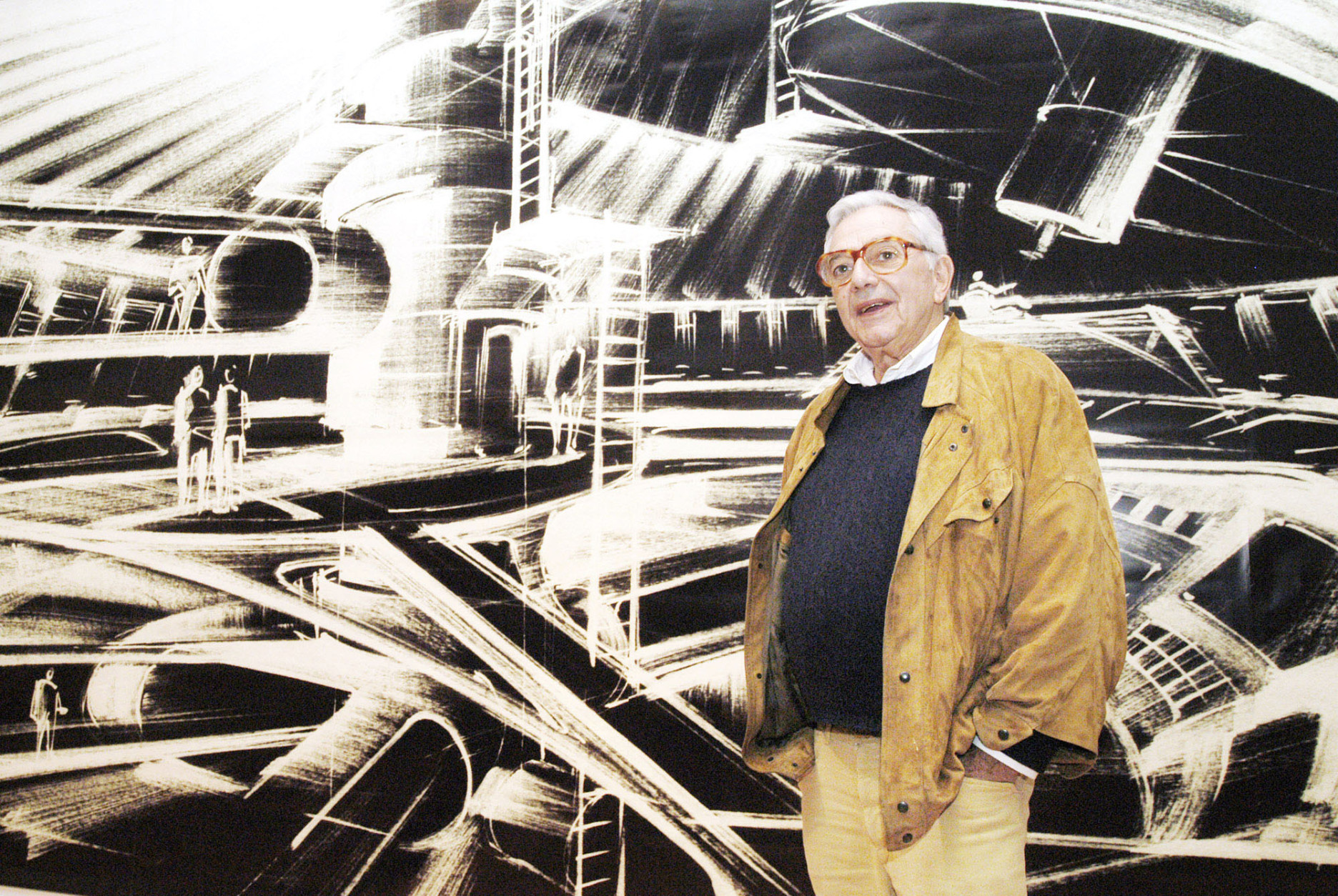 FILE - In this Oct. 31, 2002 file photo, German film designer Ken Adam stands in front of one of his futuristic designs at the exhibition "James Bond - Berlin - Hollywood" in the museum "Martin-Gropius-Bau" in Berlin. Adam died at the age of 95. His death was confirmed Thursday, March 10, 2016, by the official James Bond Twitter account. Adams death was first reported by the BBC, which said he died at his home in London. (AP Photo/Jens Meyer, File)