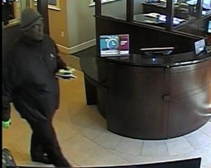 The FBI is searching for a man used a hoax bomb during a robbery at an Alexandria bank Monday.