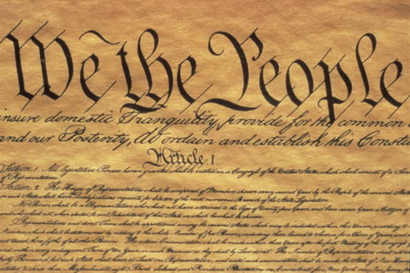 This is the Preamble to the US Constitution, It starts with the phrase We The People and shows only some of the writing from the upper left hand corner of the document of the Constitution, It is written on parchment paper that is now faded, showing its age. (Photo by Visions of America/UIG via Getty Images)