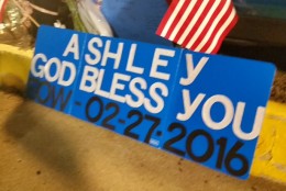 A sign remembering Officer Ashley Guindon. (WTOP/Kathy Stewart)