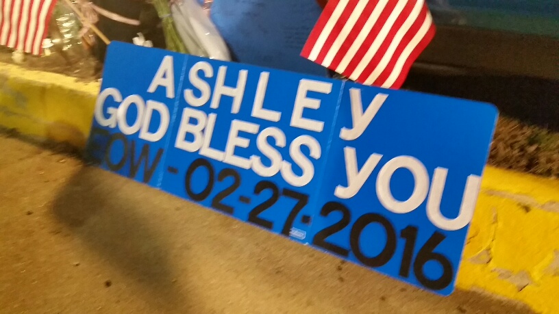 A sign remembering Officer Ashley Guindon. (WTOP/Kathy Stewart)