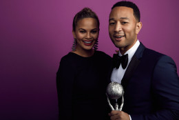 PASADENA, CA - FEBRUARY 05:  Singer John Legend (R), winner of the President's Award, and TV personality Chrissy Teigen pose for a portrait during the 47th NAACP Image Awards presented by TV One at Pasadena Civic Auditorium on February 5, 2016 in Pasadena, California.  (Photo by JSquared Photography/Getty Images for NAACP Image Awards)