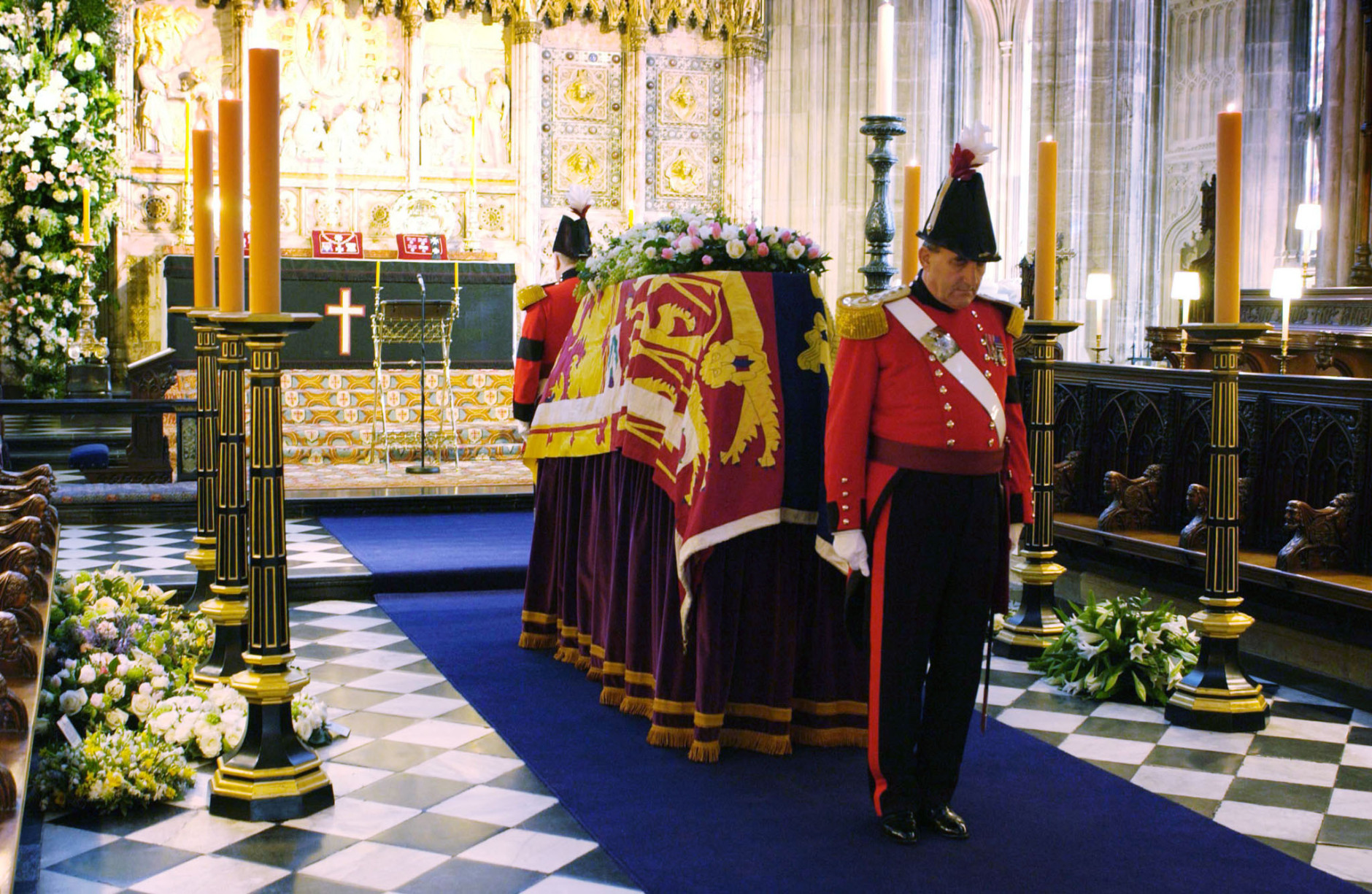 Two military knights guard the coffin of Britain's Princess Margaret before her funeral in St George's Chapel in Windsor Castle, Windsor, England Friday, Feb. 15, 2002. Some 450 people including more than 30 royals were expected at the service. Princess Margaret, the younger sister of Britain's Queen Elizabeth II, died Saturday aged 71. (AP Photo/Fiona Hanson/WPA pool)