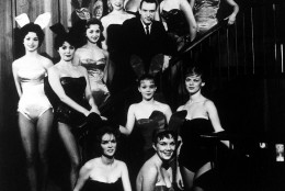 Hugh Hefner, founder and chairman of the Playboy Enterprises, Inc., is pictured amid a group of Bunnies, at the flagship Playboy Club, in Chicago, Ill., circa 1960. (AP Photo)