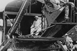 U.S. President Theodore Roosevelt tests a steam shovel at the Culebra Cut during construction of the Panama Canal, a project he championed, November  1906.  Roosevelt's visit to Panama made him the first sitting U.S. president to travel abroad. (AP Photo)