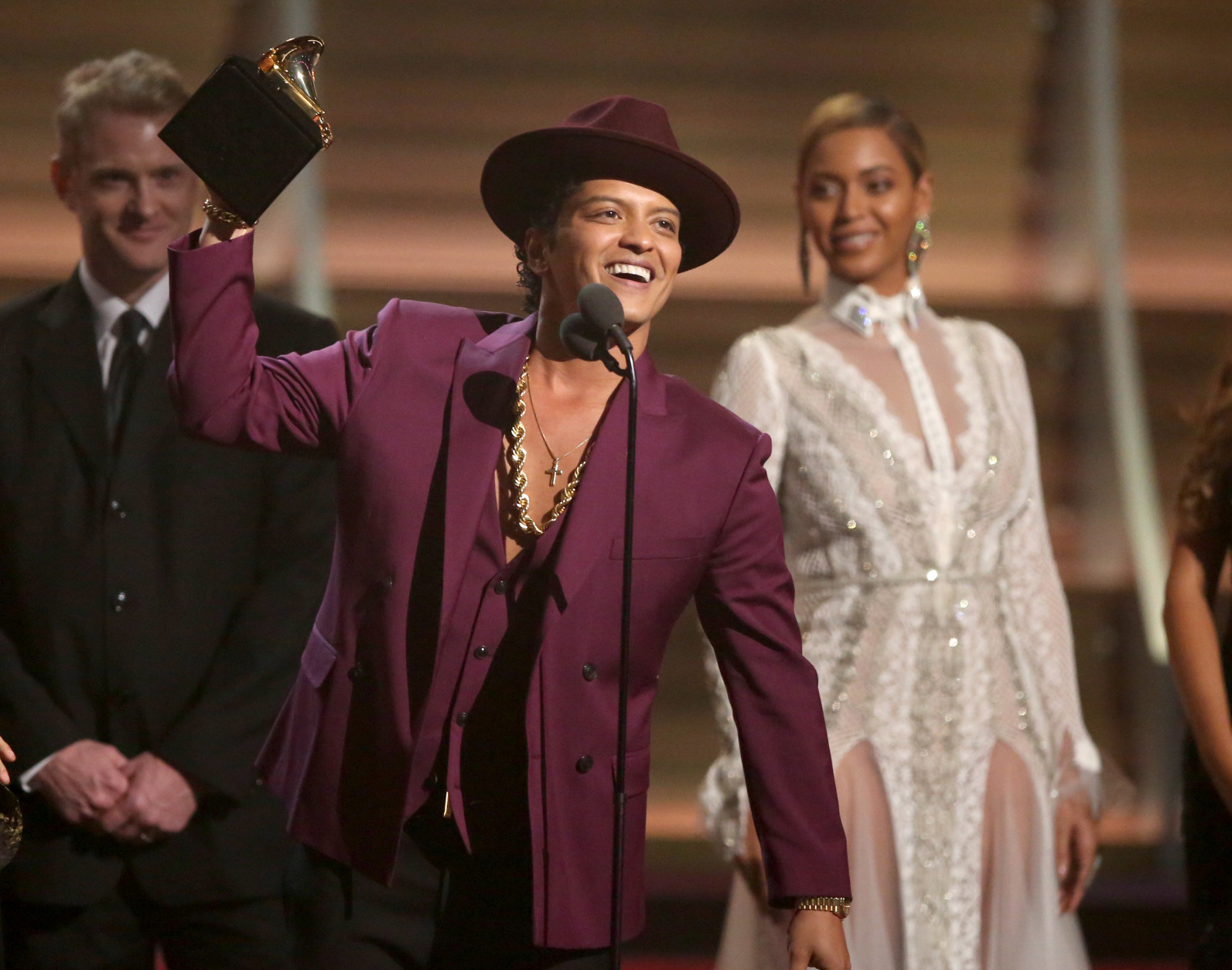 Bruno Mars accept the award for record of the year for Uptown Funk at the 58th annual Grammy Awards on Monday, Feb. 15, 2016, in Los Angeles. (Photo by Matt Sayles/Invision/AP)