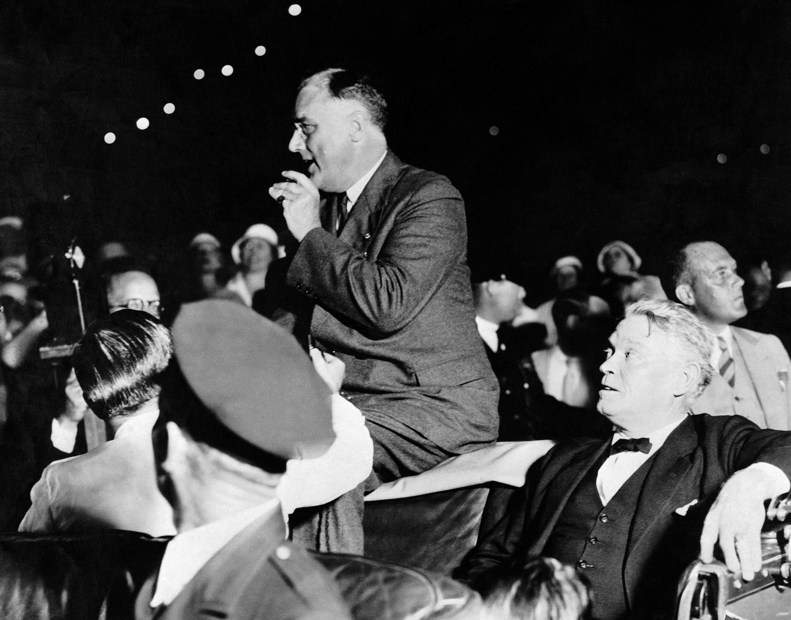 President-elect Franklin Roosevelt is shown as he assured a crowd of supporters that he had received no injury after Joe (Giuseppe) Zingara attempted to assassinate him at a public reception in Bayfront Park at Miami the night of February 15, 1933.   Zingara's bullets missed Mr. Roosevelt but struck Mayor Anton Cermak of Chicago and four other persons.  (AP Photo)