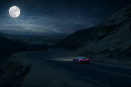 This image provided by Audi shows a scene from the company's "The Commander" spot for Super Bowl 50. The ad features the new Audi R8 V10. (Audi via AP)