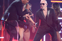 Robin Thicke, left, and Pitbull perform at the 58th annual Grammy Awards on Monday, Feb. 15, 2016, in Los Angeles. (Photo by Matt Sayles/Invision/AP)