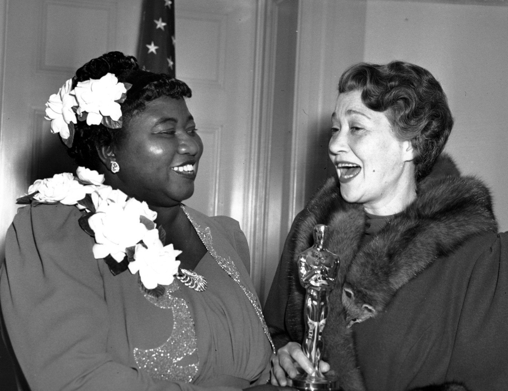 Hattie McDaniel, left, was given the Motion Picture Academy award for the best performance of an actress in a supporting role in 1939 for her work as "Mammy" in the film version of "Gone With the Wind"  on Feb. 29, 1940 in Los Angeles, Calif.  The presentation of the award was given by actress Fay Bainter, right.  (AP Photo)