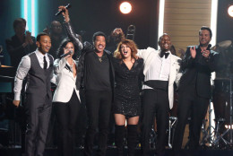 John Legend, from left, Demi Lovato, Lionel Richie, Meghan Trainor, Tyrese, and Luke Bryan perform a tribute to MusiCares Person of the Year honoree Lionel Richie at the 58th annual Grammy Awards on Monday, Feb. 15, 2016, in Los Angeles. (Photo by Matt Sayles/Invision/AP)
