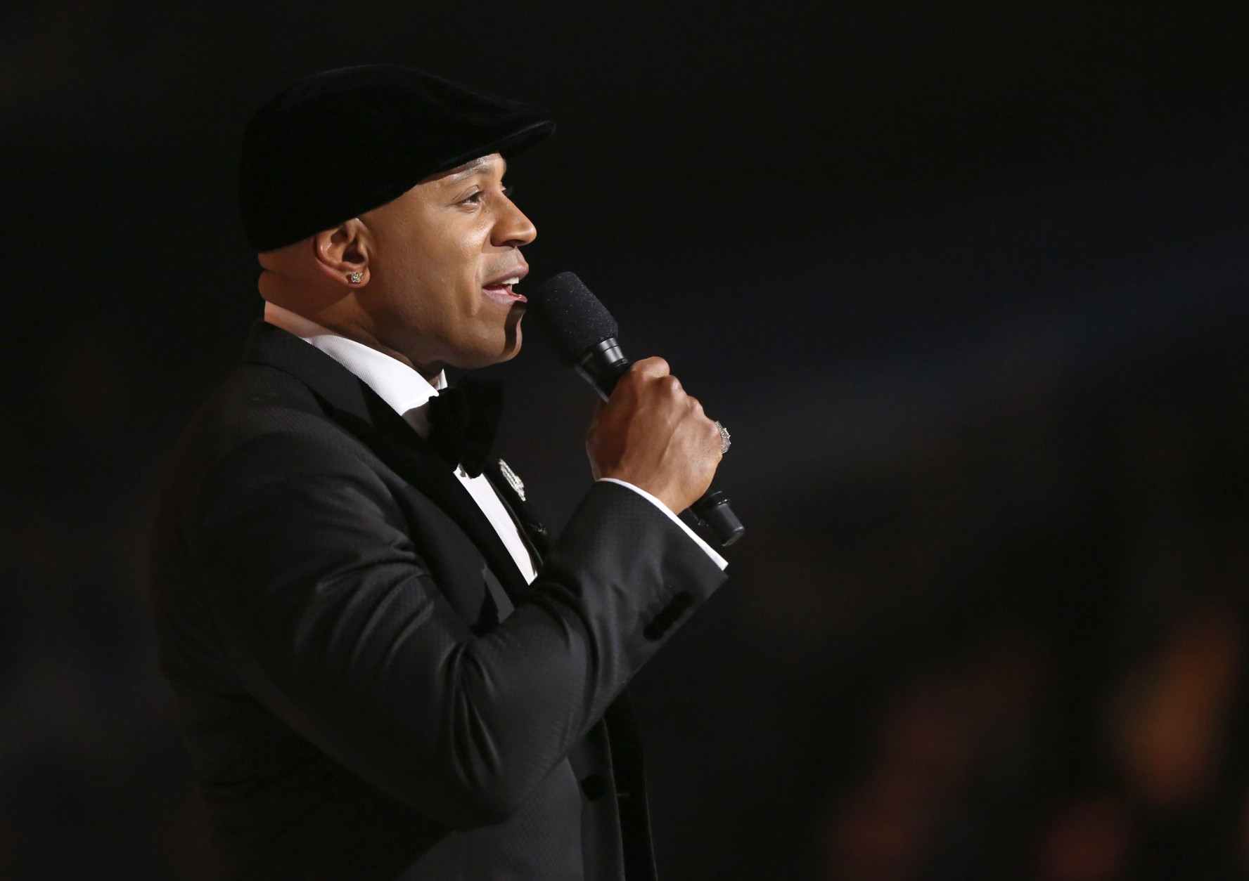 Host LL Cool J speaks at the 58th annual Grammy Awards on Monday, Feb. 15, 2016, in Los Angeles. (Photo by Matt Sayles/Invision/AP)
