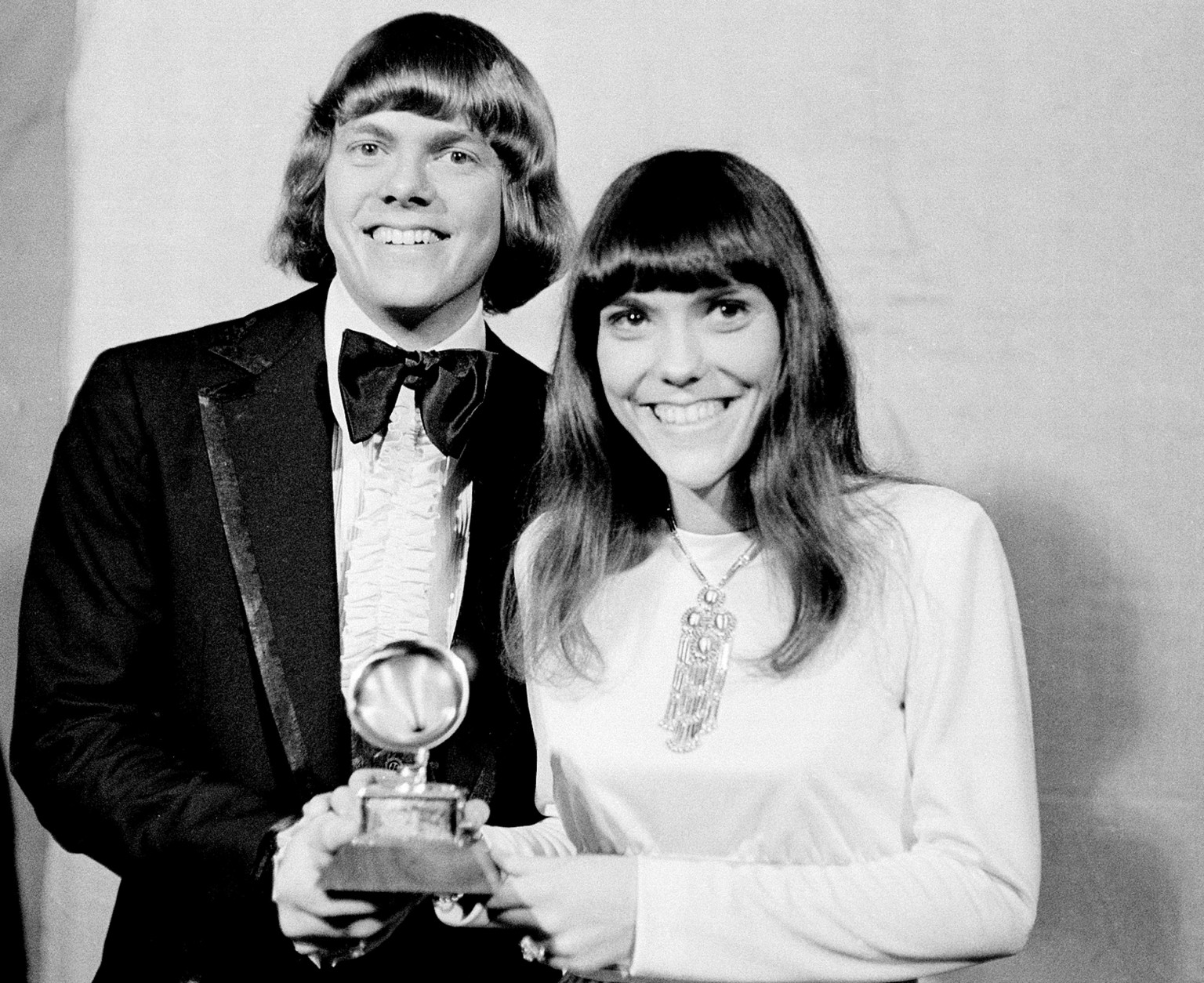 The Carpenters, Richard and Karen, pose with their Grammy during the 13th annual 1970 Grammy Awards in Los Angeles, Ca., March 17, 1971.  The brother-sister duo was named best new artist of the year, 1970, and also won as the best contemporary duo or group vocalists for "Close to You."  (AP Photo)