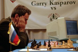 Garry Kasparov ponders his chess moves during his third game with IBM's Deep Blue Tuesday, Feb.13, 1996 at the Convention Center in Philadelphia. Wednesday's game ended in a draw, but Kasparov ended up winning the final game and series 4-2 against the supercomputer. "Fighting this computer has changed the way I--and I imagine most others--will approach the game in the future," he said after winning the final game Saturday night.  (AP Photo/George Widman)