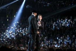 LL Cool J, left, and James Corden introduce a tribute to Lionel Richie at the 58th annual Grammy Awards on Monday, Feb. 15, 2016, in Los Angeles. (Photo by Matt Sayles/Invision/AP)