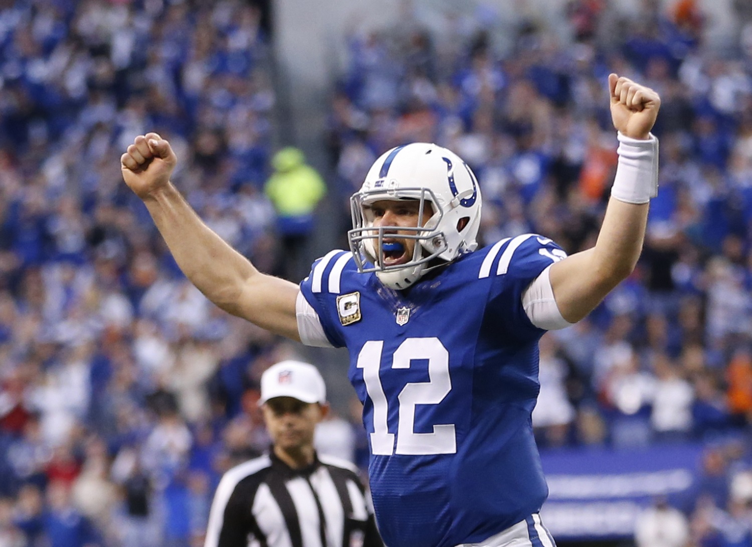 Indianapolis Colts quarterback Andrew Luck celebrates after Jack Doyle scored on a three yard touchdown reception during the first half of an NFL football game against the Denver Broncos, Sunday, Nov. 8, 2015, Indianapolis. (AP Photo/AJ Mast)
