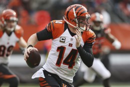 Cincinnati Bengals quarterback Andy Dalton scrambles in the first half of an NFL football game against the Cleveland Browns, Sunday, Dec. 6, 2015, in Cleveland. (AP Photo/Ron Schwane)