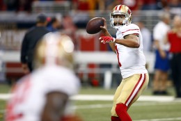 San Francisco 49ers quarterback Colin Kaepernick warms up before the start of an NFL football game between the St. Louis Rams and the San Francisco 49ers Sunday, Nov. 1, 2015, in St. Louis. (AP Photo/Billy Hurst)
