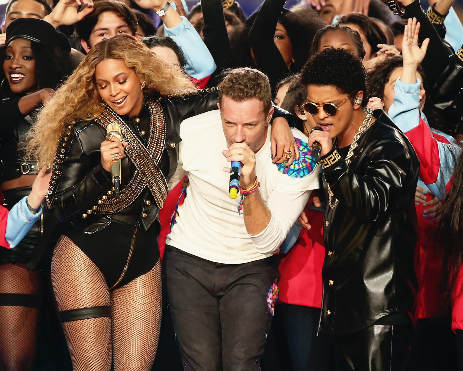 SANTA CLARA, CA - FEBRUARY 07:  (L-R) Beyonce, Chris Martin of Coldplay and Bruno Mars perform onstage during the Pepsi Super Bowl 50 Halftime Show at Levi's Stadium on February 7, 2016 in Santa Clara, California.  (Photo by Christopher Polk/Getty Images)