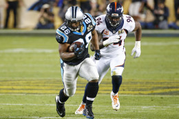 SANTA CLARA, CA - FEBRUARY 07:  Jonathan Stewart #28 of the Carolina Panthers runs with the ball in the second half against  DeMarcus Ware #94 of the Denver Broncos during Super Bowl 50 at Levi's Stadium on February 7, 2016 in Santa Clara, California.  (Photo by Al Bello/Getty Images)