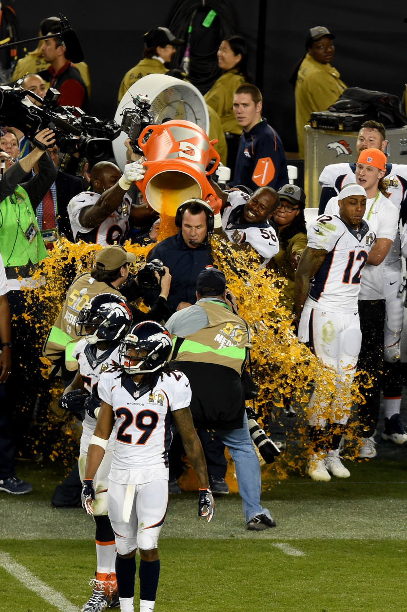 SANTA CLARA, CA - FEBRUARY 07:  Head coach Gary Kubiak of the Denver Broncos is splashed with Gatorade in the final moments of Super Bowl 50 at Levi's Stadium on February 7, 2016 in Santa Clara, California.  (Photo by Thearon W. Henderson/Getty Images)