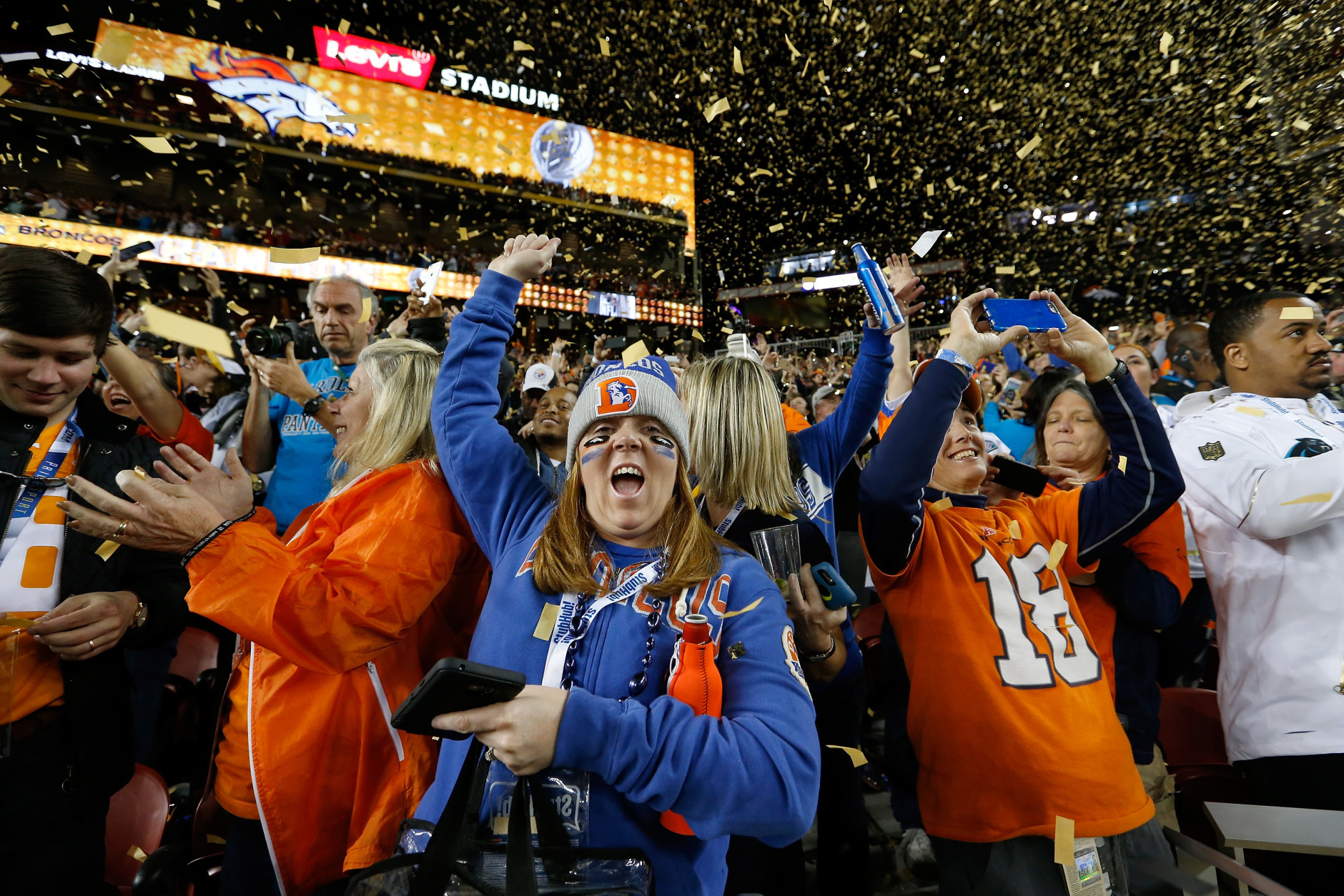 SANTA CLARA, CA - FEBRUARY 07:  Fans of the Denver Broncos celebrate in the stands following Super Bowl 50 at Levi's Stadium on February 7, 2016 in Santa Clara, California. The Carolina Panthers were defeated by the Denver Broncos 24-10. (Photo by Sean M. Haffey/Getty Images)