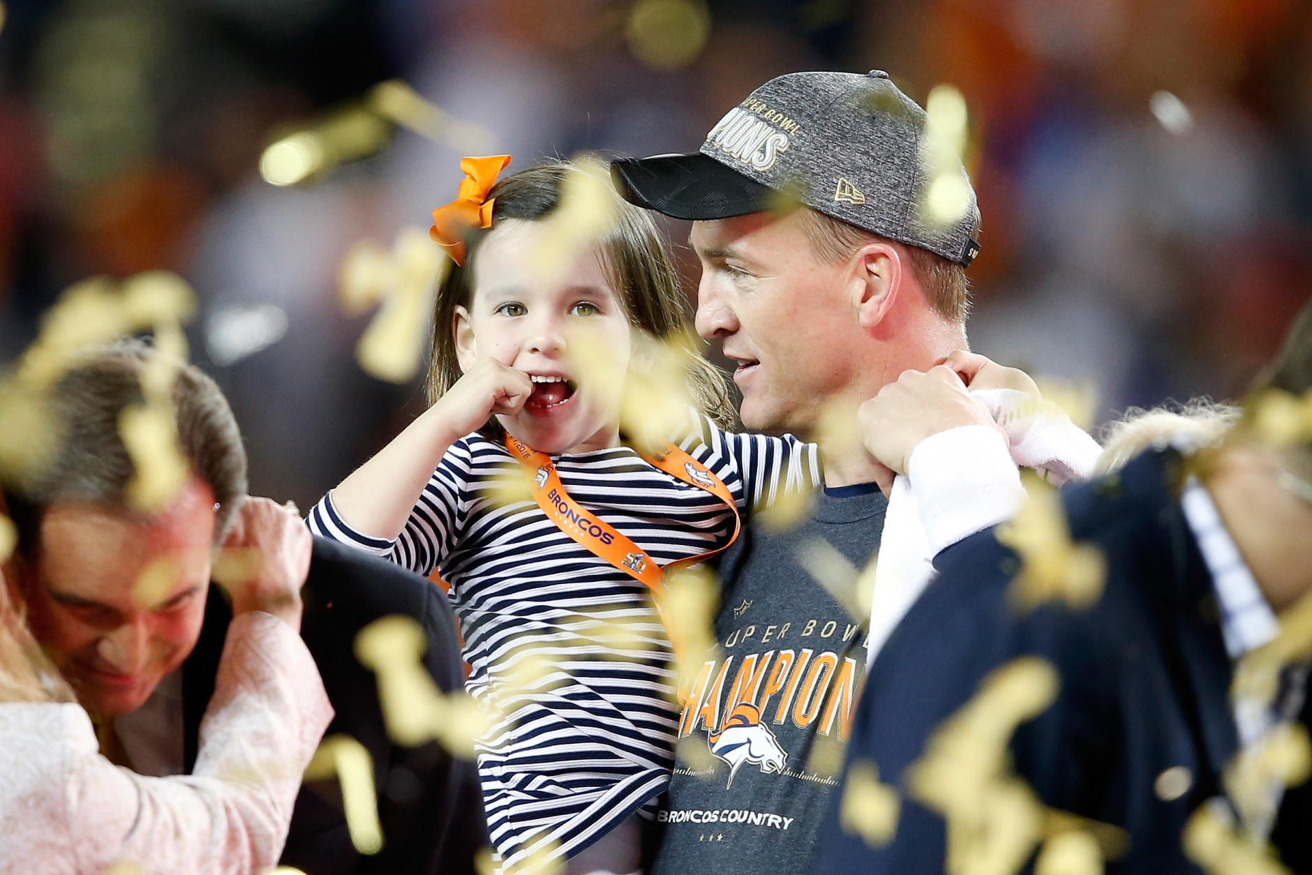 SANTA CLARA, CA - FEBRUARY 07:  Peyton Manning #18 of the Denver Broncos holds his daughter Mosley after the Denver Broncos defeated the Carolina Panthers with a score of 24 to 10 to win Super Bowl 50 at Levi's Stadium on February 7, 2016 in Santa Clara, California.  (Photo by Sean M. Haffey/Getty Images)