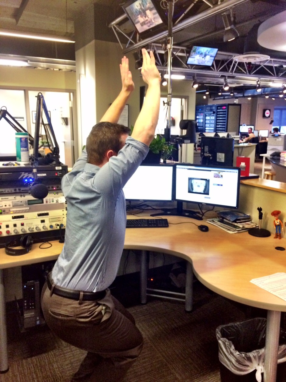 Get rid of your chair for a few minutes and try chair pose instead. WTOP Entertainment Editor Jason Fraley demonstrates. (WTOP/Rachel Nania) 