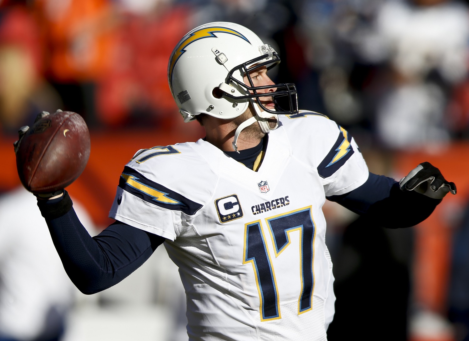 San Diego Chargers quarterback Philip Rivers throws during warm ups during an NFL football game against the Denver Broncos, Sunday, Jan. 3, 2016, in Denver. (AP Photo/David Zalubowski)