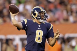St. Louis Rams quarterback Sam Bradford passes in the first quarter of a preseason NFL football game against the Cleveland Browns Saturday, Aug. 23, 2014, in Cleveland. (AP Photo/Tony Dejak)