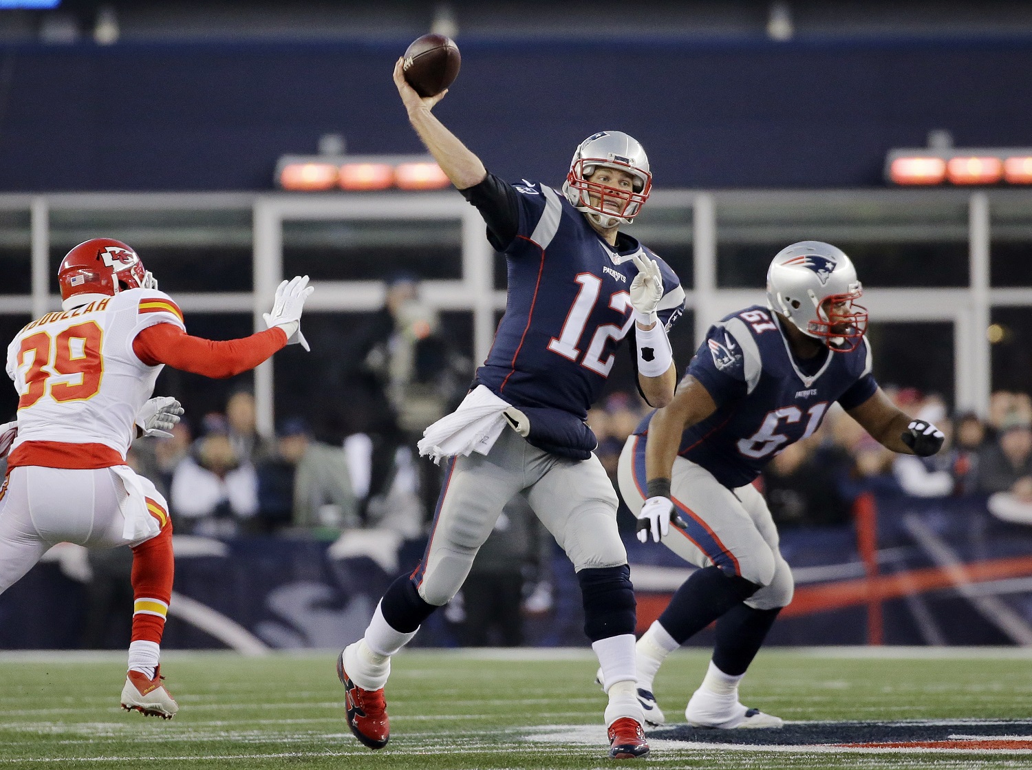 New England Patriots quarterback Tom Brady (12) passes against the Kansas City Chiefs in the first half of an NFL divisional playoff football game, Saturday, Jan. 16, 2016, in Foxborough, Mass. (AP Photo/Elise Amendola)