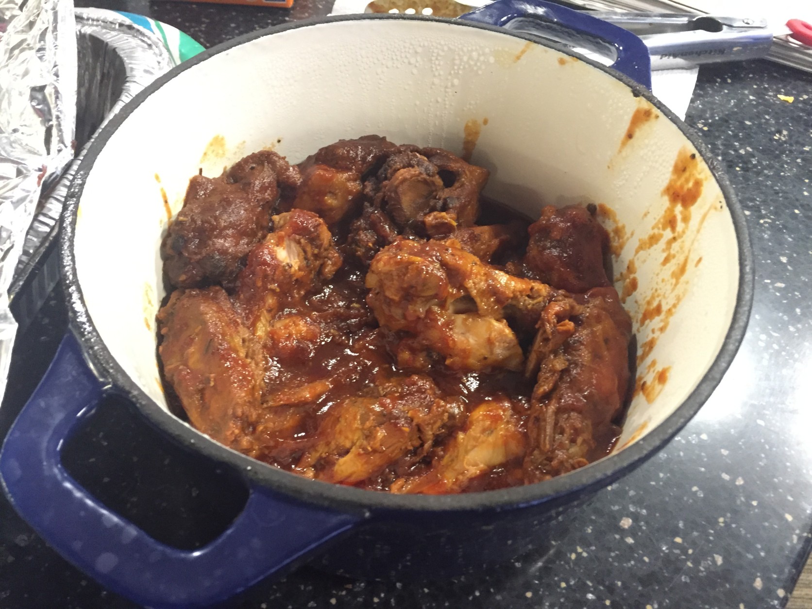 Anchor Mark Lewis's Bourbon Barbecue Wings have quite a kick. Get it? Kick? Football? (WTOP/Neal Augenstein)