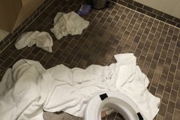 Several items are seen on the floor of a bathroom on the Anthem of the Seas after the cruise ship was rocked by a storm. (Courtesy Cassie Lauterette)