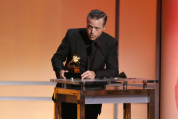 Jason Isbell accepts the award for best americana album for "Something More Than Free" at the 58th annual Grammy Awards on Monday, Feb. 15, 2016, in Los Angeles. (Photo by Matt Sayles/Invision/AP)