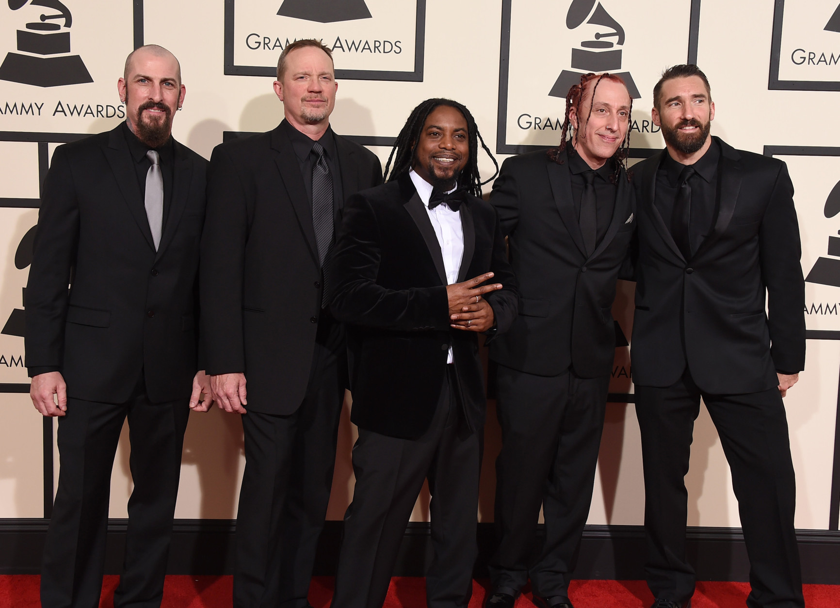 John Connolly, from left, Vince Hornsby, Lajon Witherspoon, Morgan Rose and Clint Lowery, of Sevendust, arrive at the 58th annual Grammy Awards at the Staples Center on Monday, Feb. 15, 2016, in Los Angeles. (Photo by Jordan Strauss/Invision/AP)