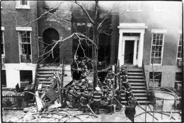 Firefighters stand amid the smoke and wreckage from an explosion in the basement of 18 West 11th Street, New York, New York, March 6, 1970. The Greenwich Village house was being used by members of the Weathermen (later Weather Underground) and the explosion, caused by the accidental detonation of a bomb during its construction, resulted in three deaths. (Photo by Fred W. McDarrah/Getty Images)