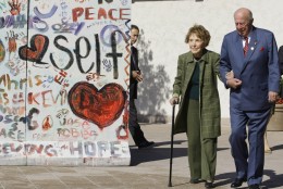Former First Lady Nancy Reagan, left, is helped by George Shultz, Secretary of State under President Reagan, as they arrive at The Ronald Reagan Presidential Library in Simi Valley, Calif. on Friday, November 6, 2009. The Ronald Reagan Presidential Foundation and Library and The Heritage Foundation commemorate the 20th anniversary of the fall of the Berlin Wall and the advent of freedom and democracy in Eastern Europe. (AP Photo/Damian Dovarganes)