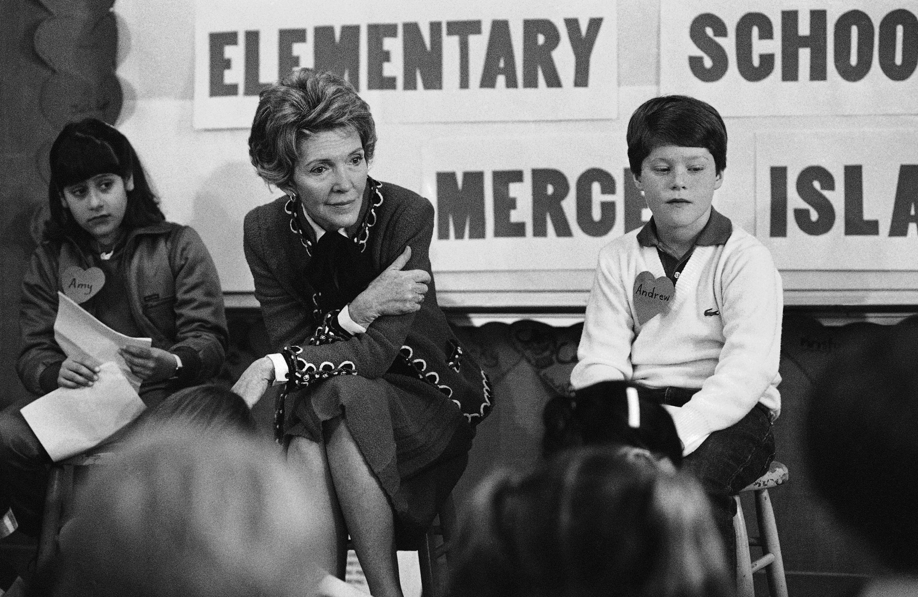FILE - In this Feb. 14, 1984 file photo, first lady Nancy Reagan sits with a fourth and fifth grade class at Island Park Elementary School on Mercer Island, Wash. where she participated in a drug education class. At left is Amy Clarfeld, 10, and Andrew Cary, 10, is at right. During a visit with schoolchildren in Oakland, Calif., Reagan later recalled, "A little girl raised her hand and said, 'Mrs. Reagan, what do you do if somebody offers you drugs?' And I said, 'Well, you just say no.' And there it was born." On the occasion of  Legalization Day, Thursday, Dec. 6, 2012, when Washingtons new law takes effect, AP takes a look back at the cultural and legal status of the evil weed in American history. (AP Photo/Barry Sweet, File)