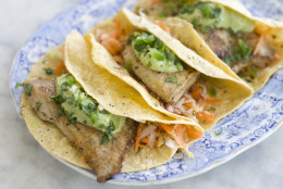 This June 3, 2013 photo taken in Concord, N.H. shows a recipe for healthy fish tacos with avocado. (AP Photo/Matthew Mead)