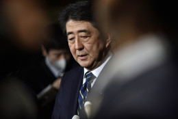 Japanese Prime Minister Shinzo Abe speaks to reporters condemning the terror attacks in Belgium, at Abe's official residence in Tokyo, Tuesday, March 22, 2016. Explosions rocked the Brussels airport and the subway system Tuesday, just days after the main suspect in the November Paris attacks was arrested in the city, police said.(Franck Robichon/Pool Photo via AP)