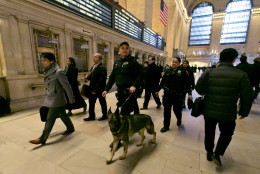 Metro-North Railroad police officers patrol Grand Central Terminal, in New York,  Tuesday, March 22, 2016. Authorities are increasing security throughout New York City following explosions at the airport and subway system in the Belgian capital of Brussels.  (AP Photo/Richard Drew)
