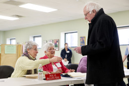 Democratic presidential candidate Sen. Bernie Sanders, I-Vt., takes a ballot to vote in the Vermont primary at the Robert Miller Community and Recreation Center in Burlington, Vermont, Tuesday, March 1, 2016, on Super Tuesday. (AP Photo/Jacquelyn Martin)???