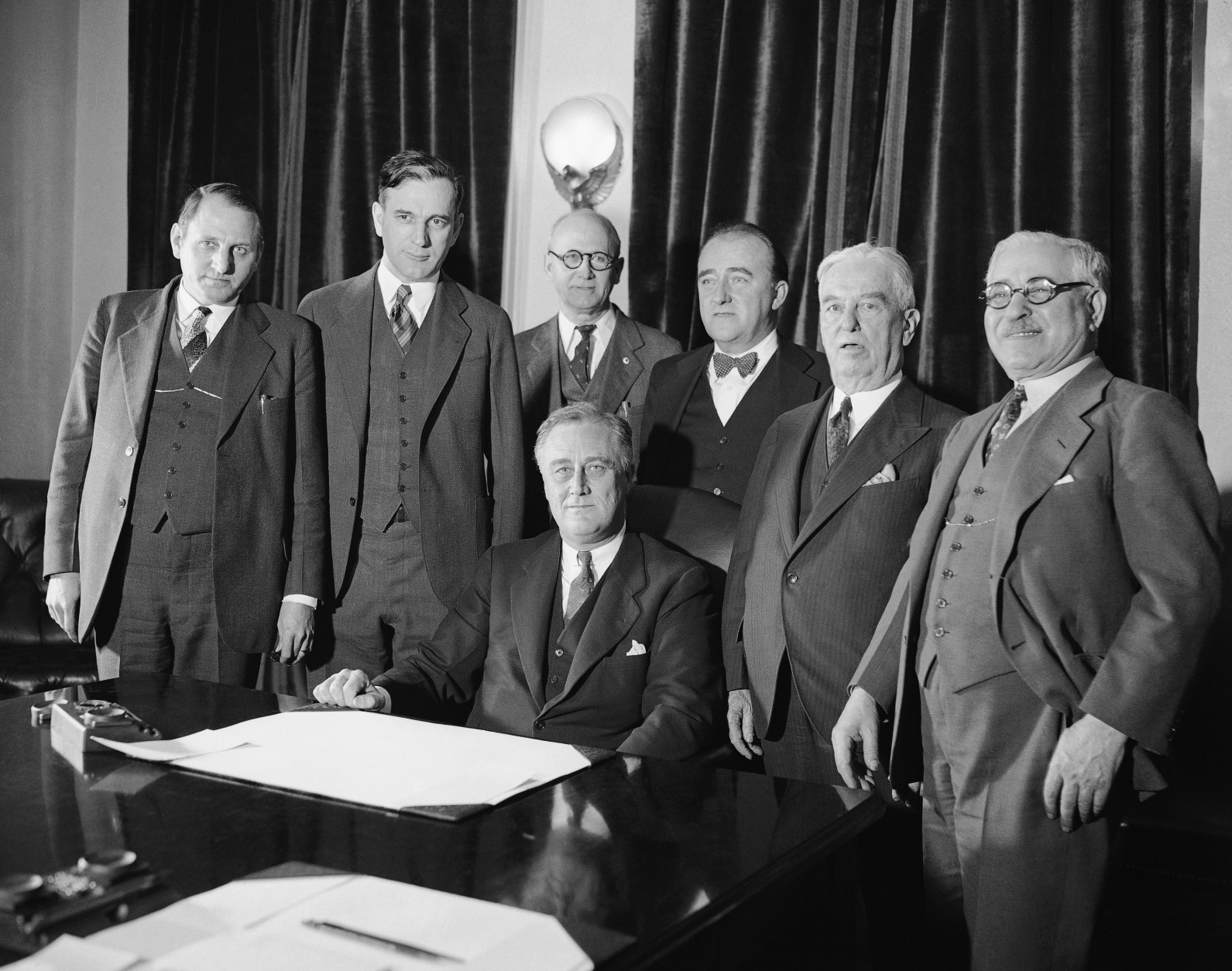 President Franklin D. Roosevelt signed the Cullen-Harrison Act, or &quot;Beer Bill&quot;, March 22, 1933, which will permit the sale of beer and wine containing 3.2% alcohol starting April 6.  He is seen with the Congressional sponsors of the bill, from left to right:  Representatives Claude V. Parsons of Illinois and John McCormack of Massachusetts; H.V. Hesselman, clerk in charge of enrolling bills; Representatives John Joseph O'Connor and Thomas Henry Cullen of New York; and Adolph Sabath of Illinois.  (AP Photo)