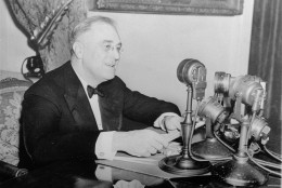 President Franklin D. Roosevelt talks to the nation in a fireside chat from the White House in this November 1937 photo.  FDR introduced his radio talks to explain administration policies and to appeal to the people for support for them during the difficult 1930's.  (AP Photo)