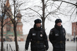 Tourist police officers patrol the Red Square in Moscow, Russia, Tuesday, March 22, 2016. Authorities in Europe have tightened security at airports, on subways, at the borders and on city streets after deadly attacks Tuesday on the Brussels airport and its subway system. (AP Photo/ Pavel Golovkin)