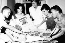 Five Peace Corps trainees, part of the 160 candidates that have reported at Pennsylvania State University for a seven-week training schedule, look at a map of the Philippine Islands in University Park, Pa. on July 31, 1961. The trainees will go there upon completion of training as teaching assistants in rural elementary schools. From left to right, Stuart Taylor, Berkeley, Calif.; Clair Ann Whiting, Cincinnati; Sandra Gay Williams, El Paso, Texas; Jenifer Grant, Armonik, N.Y.; David Pierson, Greenfield, Mass. (AP Photo/Paul Vathis)