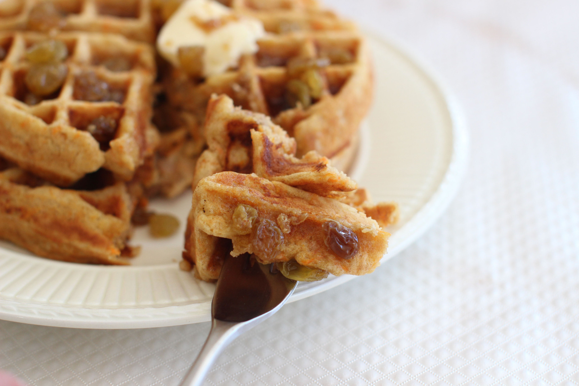 This Feb. 16, 2015 photo shows carrot cake waffles with ginger raisin syrup in Concord, N.H. (AP Photo/Matthew Mead)