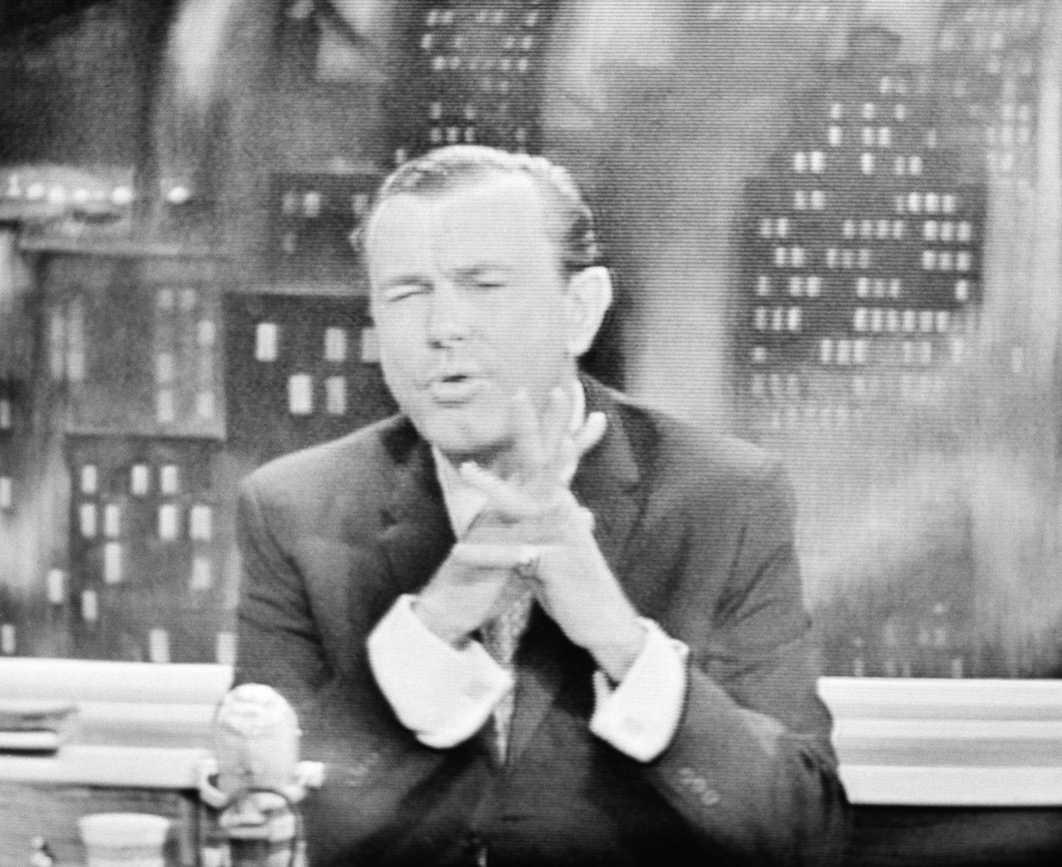 In a photo made from a monitor screen in the NBC studio, comedian Jack Paar tells his studio and television audience that he is quitting his nationwide late evening television show on Feb. 11, 1960. Before broadcasting this portion of tape, the network interrupted and said it hoped Paar would reconsider his action and return to the show. (AP Photo/Matty Zimmerman)