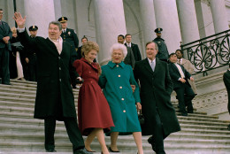 Former President Ronald Reagan, left, his wife Nancy Reagan, new first lady Barbara Bush and her husband President George Bush, right, walk down the Capitol steps after the inaugural ceremony in Washington, D.C., Friday, Jan. 20, 1989.  President Bush was sworn in as the nation's 41st president.  The Reagans are heading to an awaiting helicopter to take them to Andrews Air Force Base, Md., and onto California.  (AP Photo/J. Scott Applewhite)